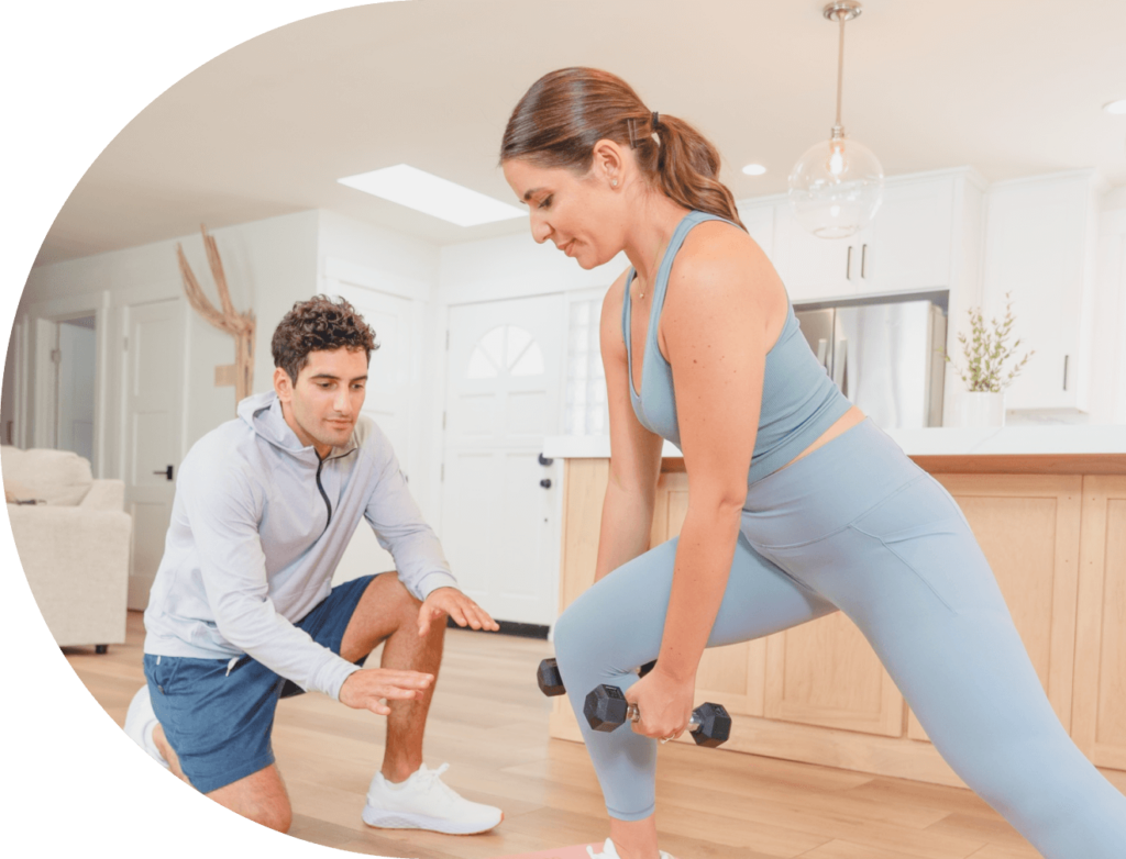 Couple exercising in their home