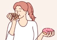 Cartoon of a lady holding doughnuts in both hands and eating one of them