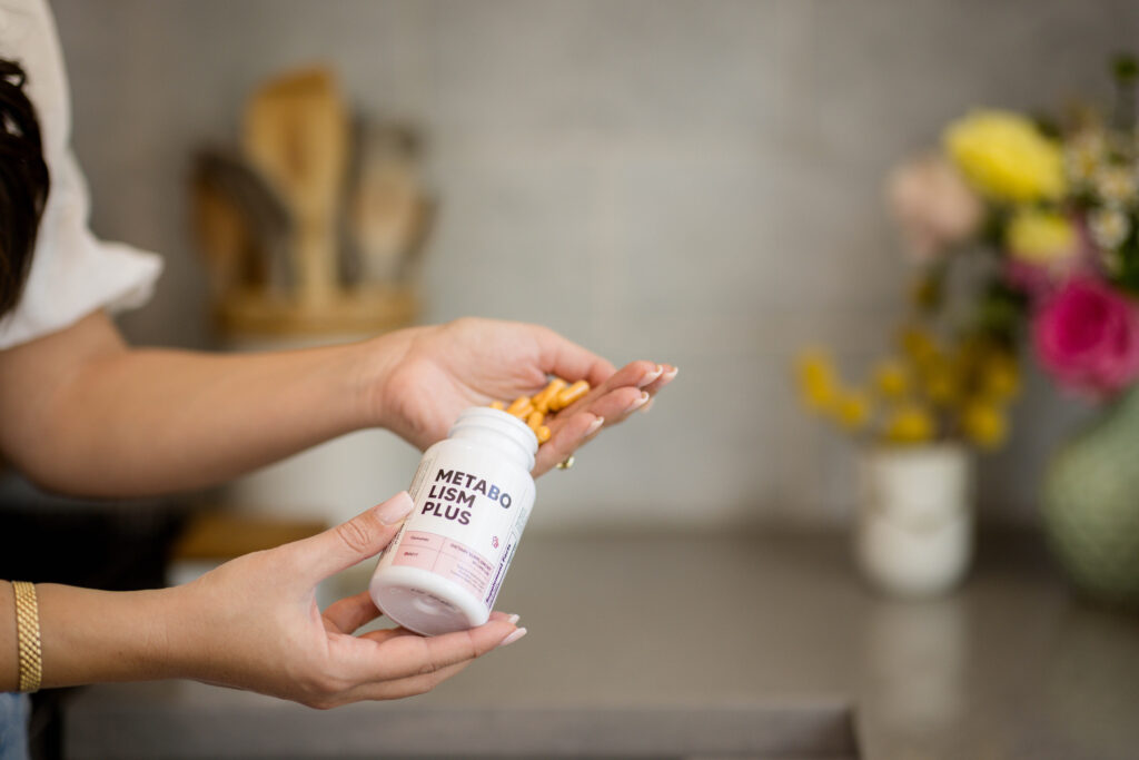 curcumin supplements poured on to a hand