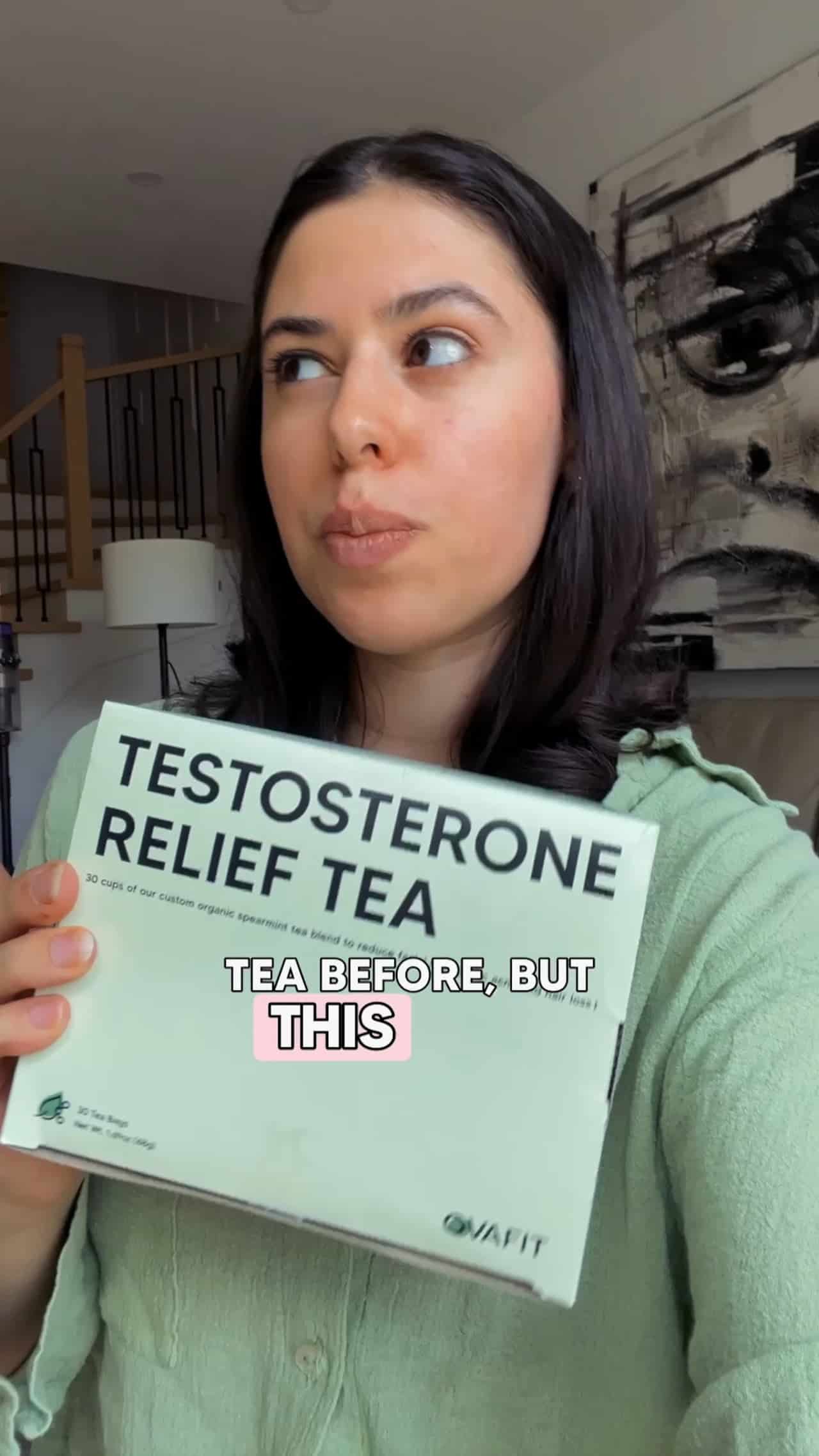 woman holding a package of Testosterone Relief Tea giving a testimonial