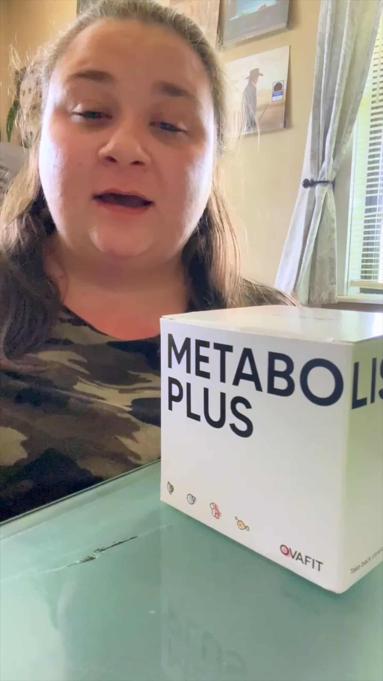 woman with a package of metabolism plus supplements in front of her giving a testimonial