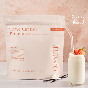 showing a bag of protein powder with a strawberry smoothie next to it