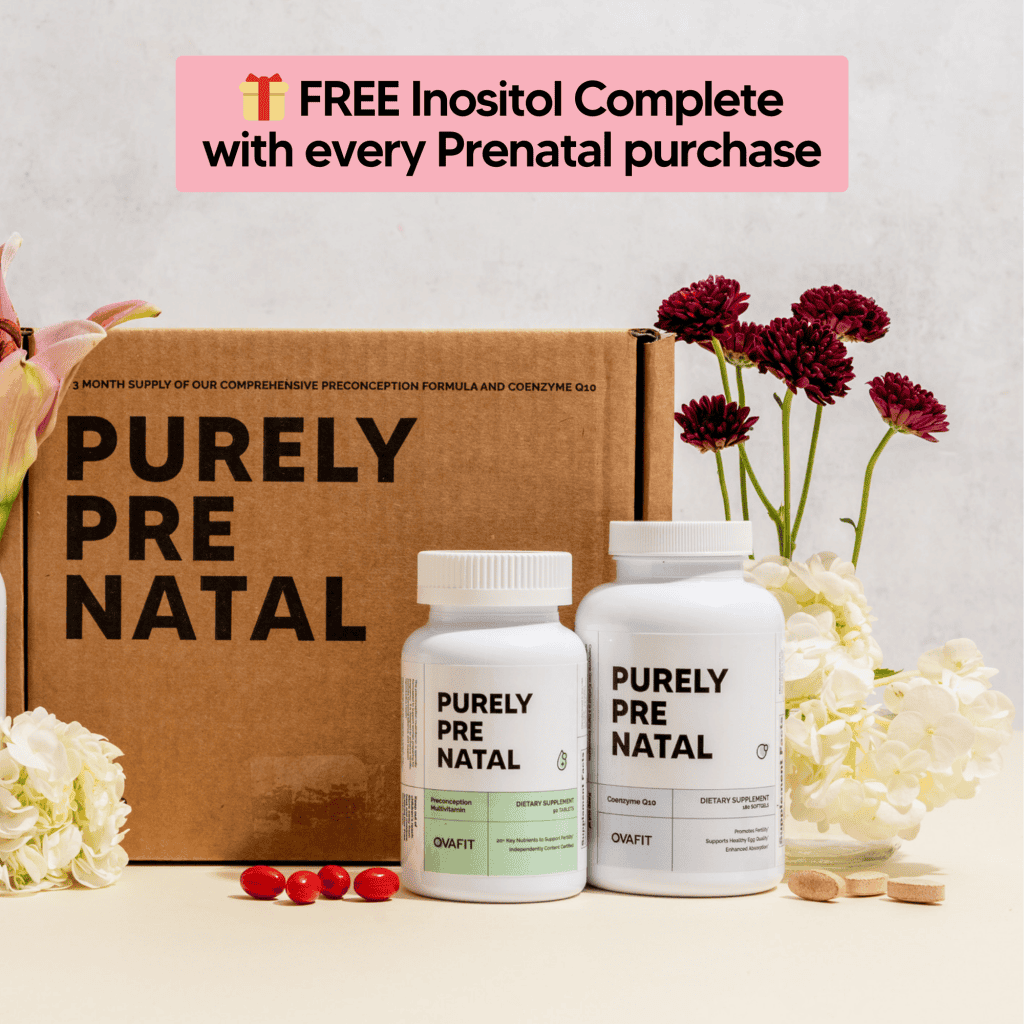 two bottles of supplements with a box and flowers