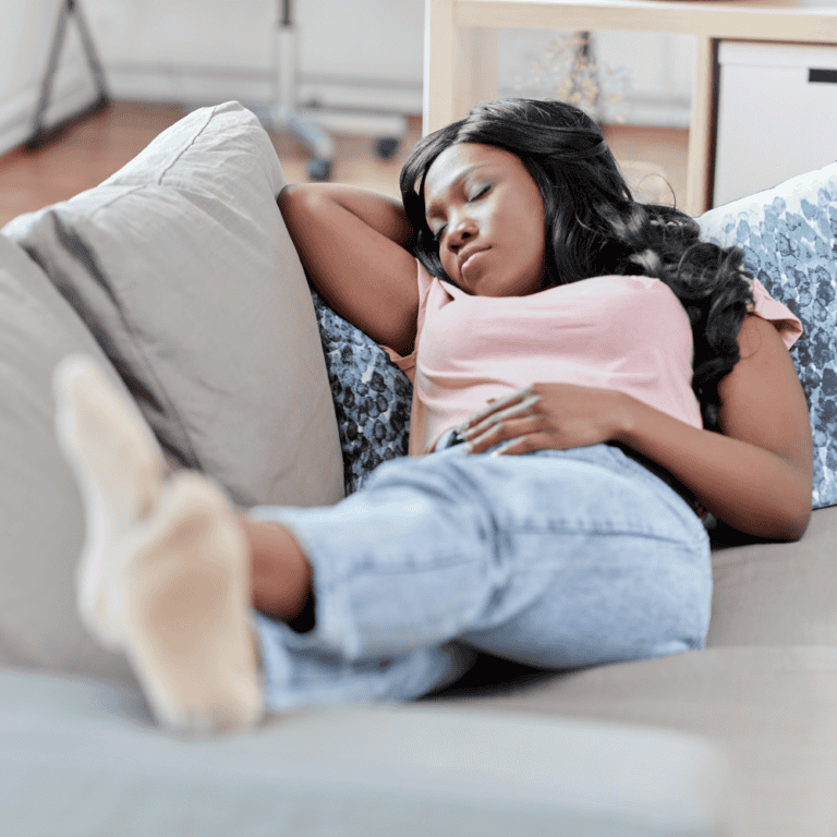 woman asleep on the couch