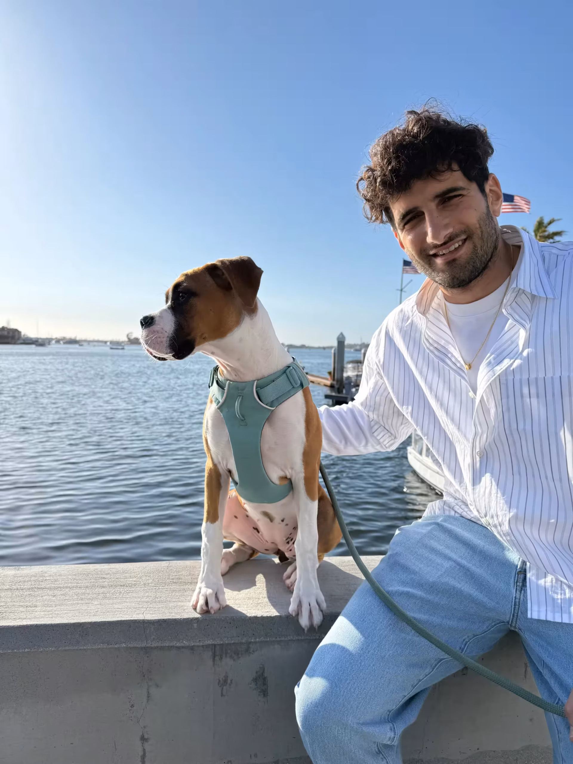 Sirak and their dog Kismet